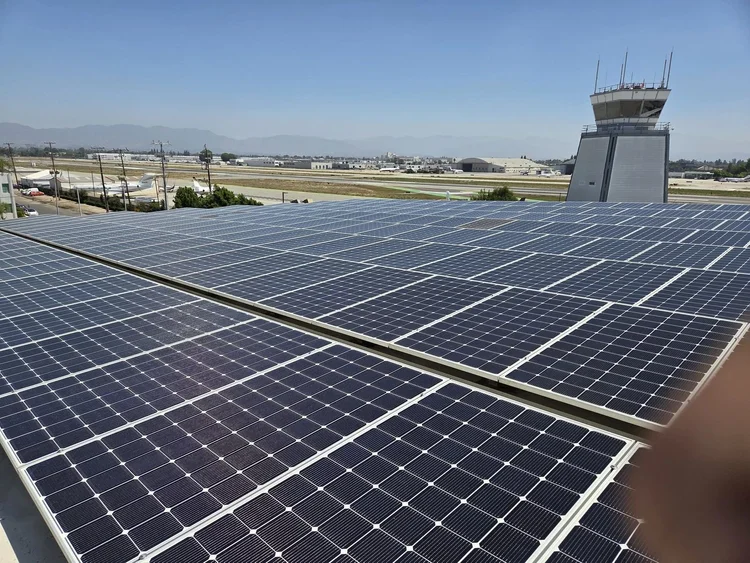 Reflective commercial solar panel surfaces following cleaning