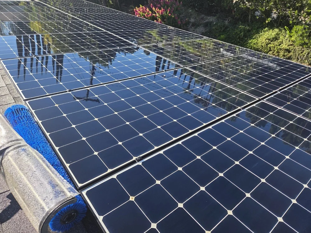 Clean rooftop solar panels after residential service