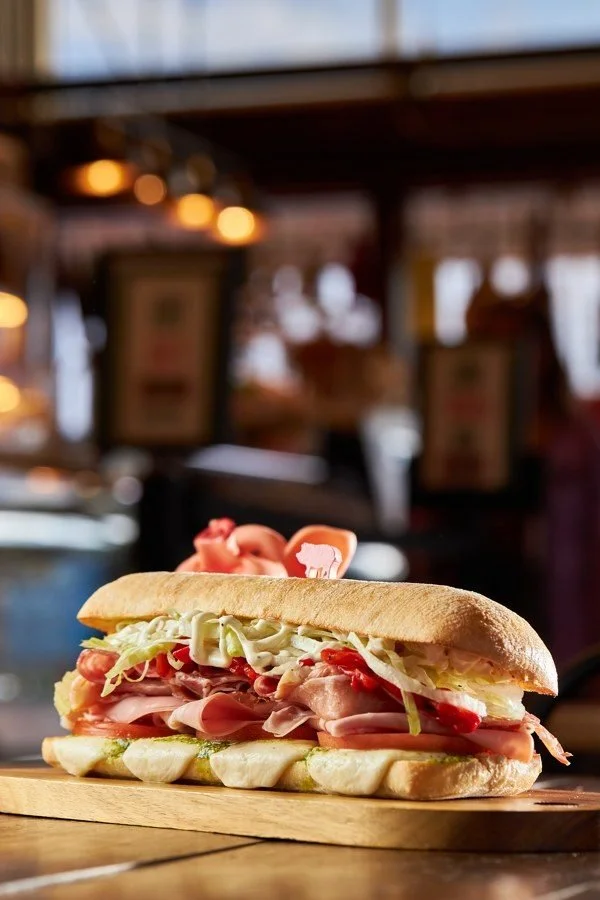 An Italian sub on the counter at Cosa Nostra Italian Deli