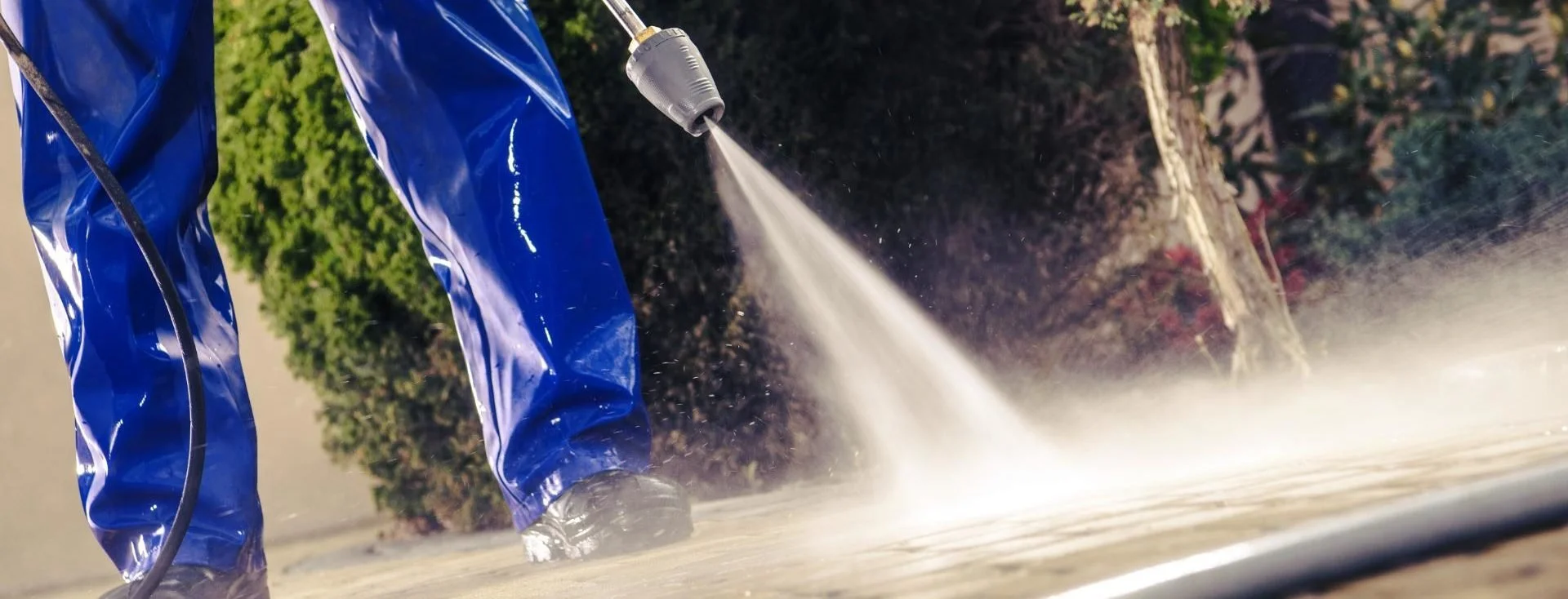 Pro pressure washing concrete patio