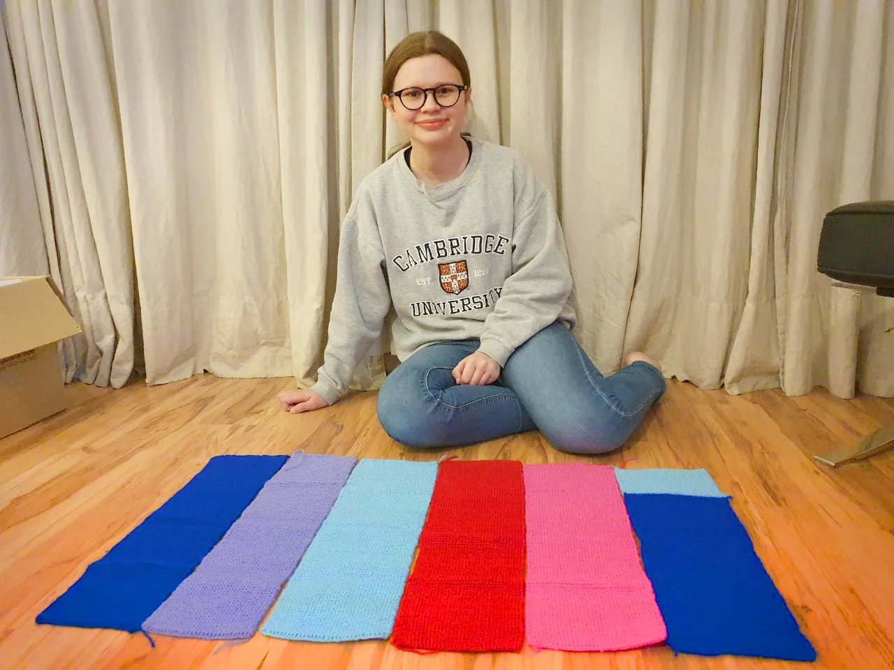 Andi showcasing crochet items at her stall