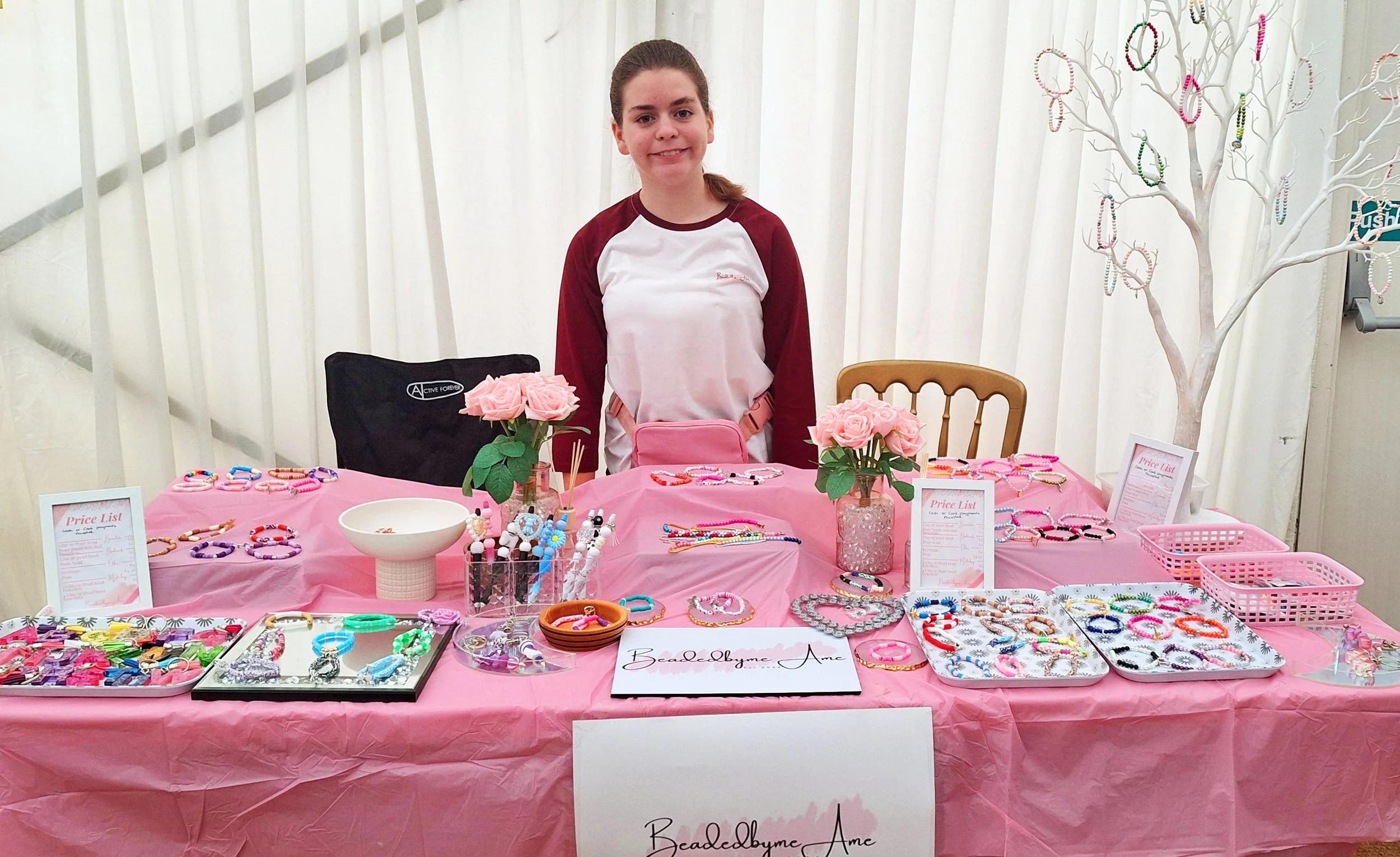Ame with her handmade beaded creations