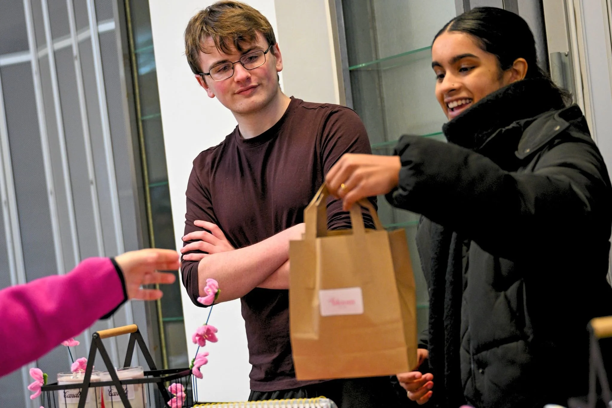 Young trader and shoppers at Poulton Teenage Market