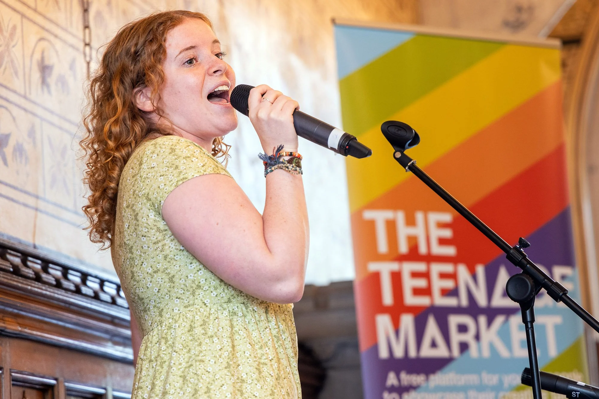 Young trader showcasing products at the Rochdale Teenage Market