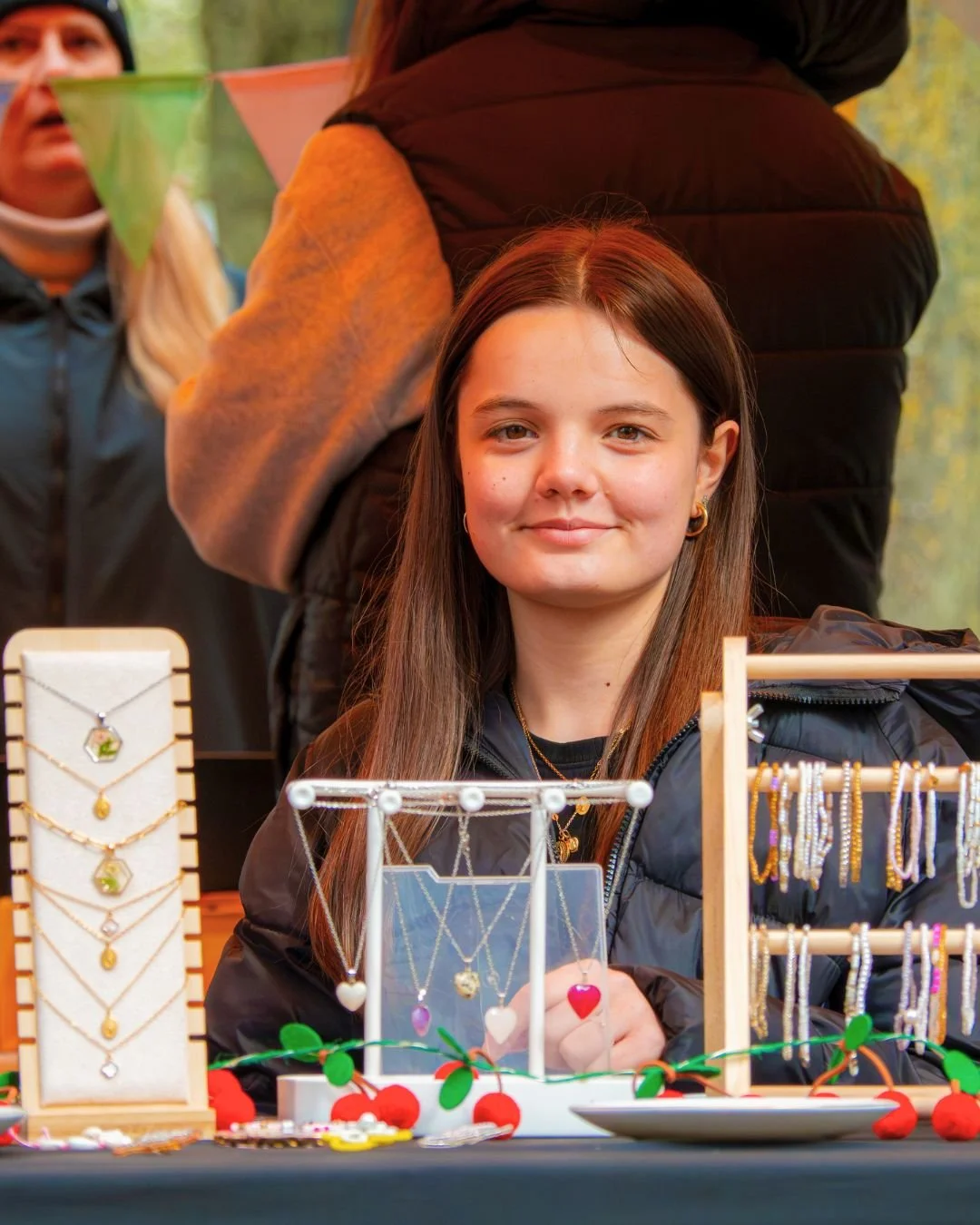 Young trader interacting with visitors in Rugby