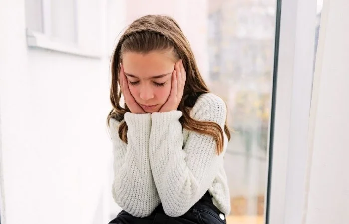 Young person feeling lonely