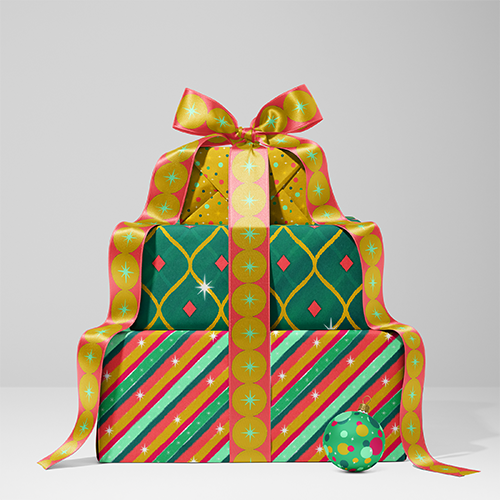 Stacked holiday gifts wrapped in colorful coordinated Merry and Bright patterns