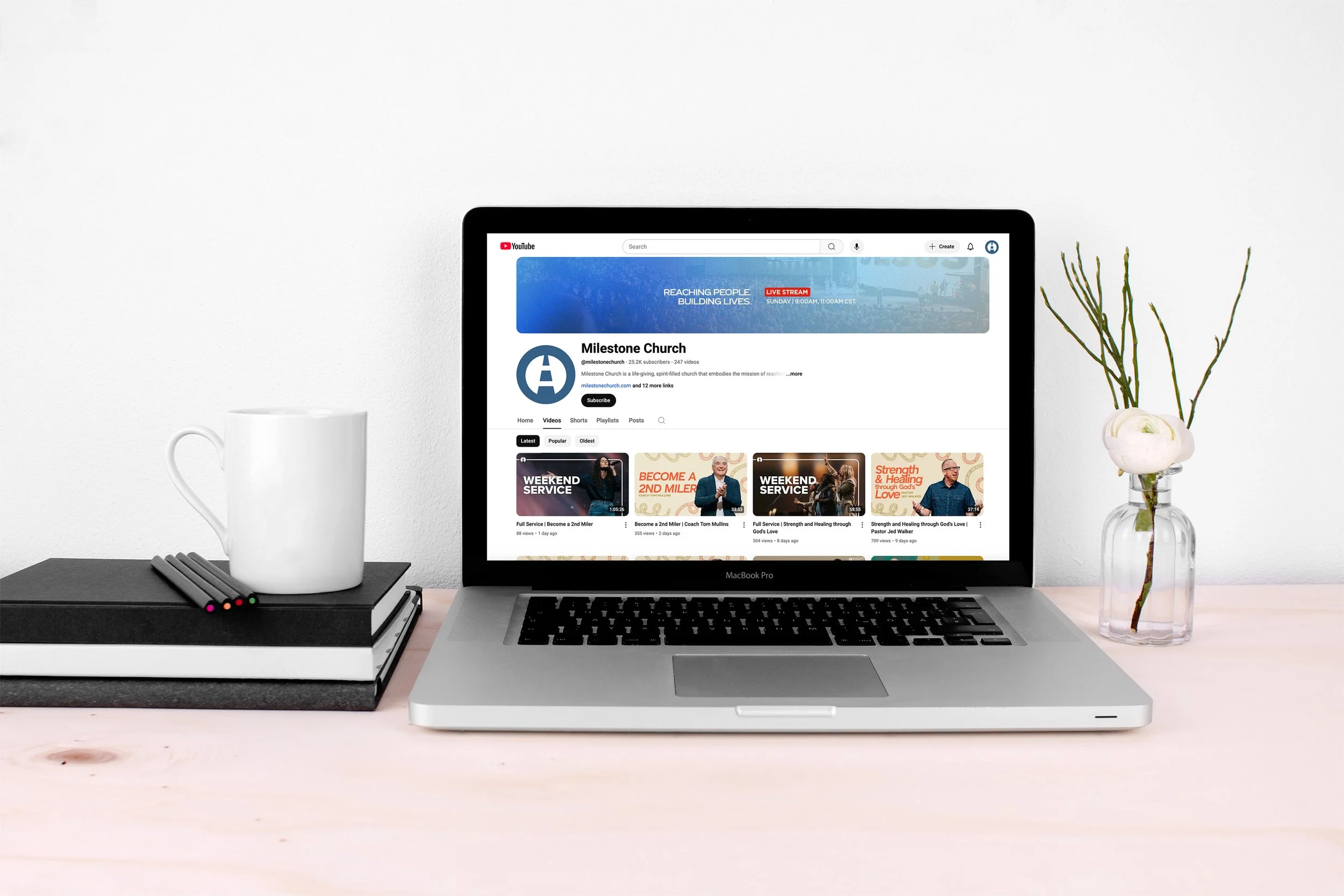 Laptop displaying Milestone Church online