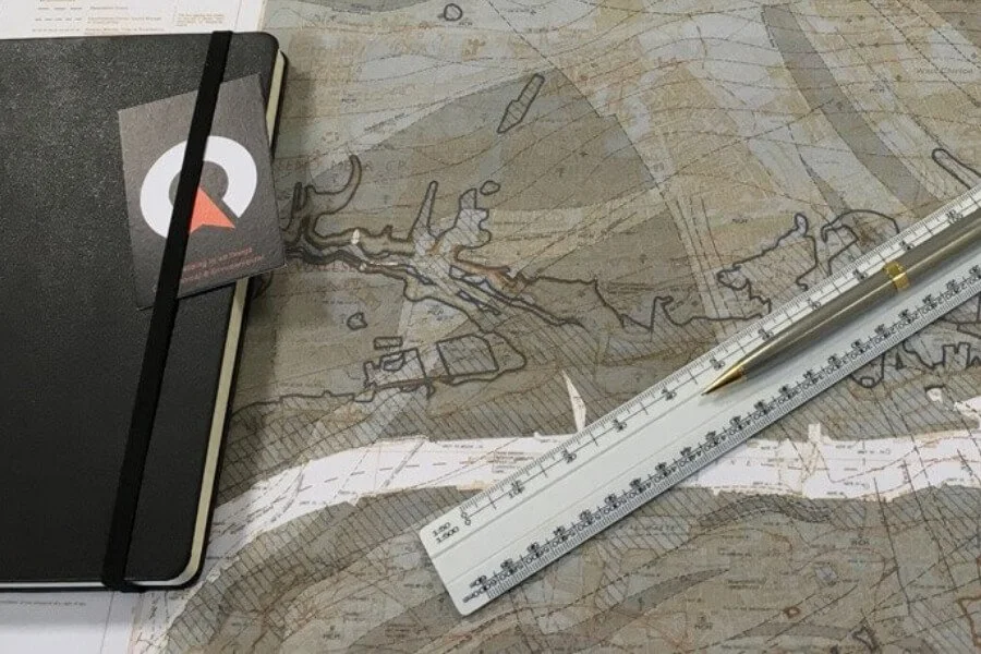 Historical geological maps, a scale ruler, and a project notebook used for a Northpoint Phase 1 Desk Study and Preliminary Risk Assessment.