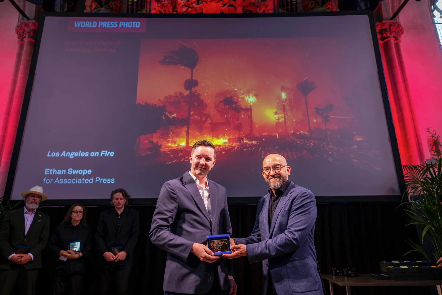 Presentation of the World Press Photo award for Los Angeles on Fire.