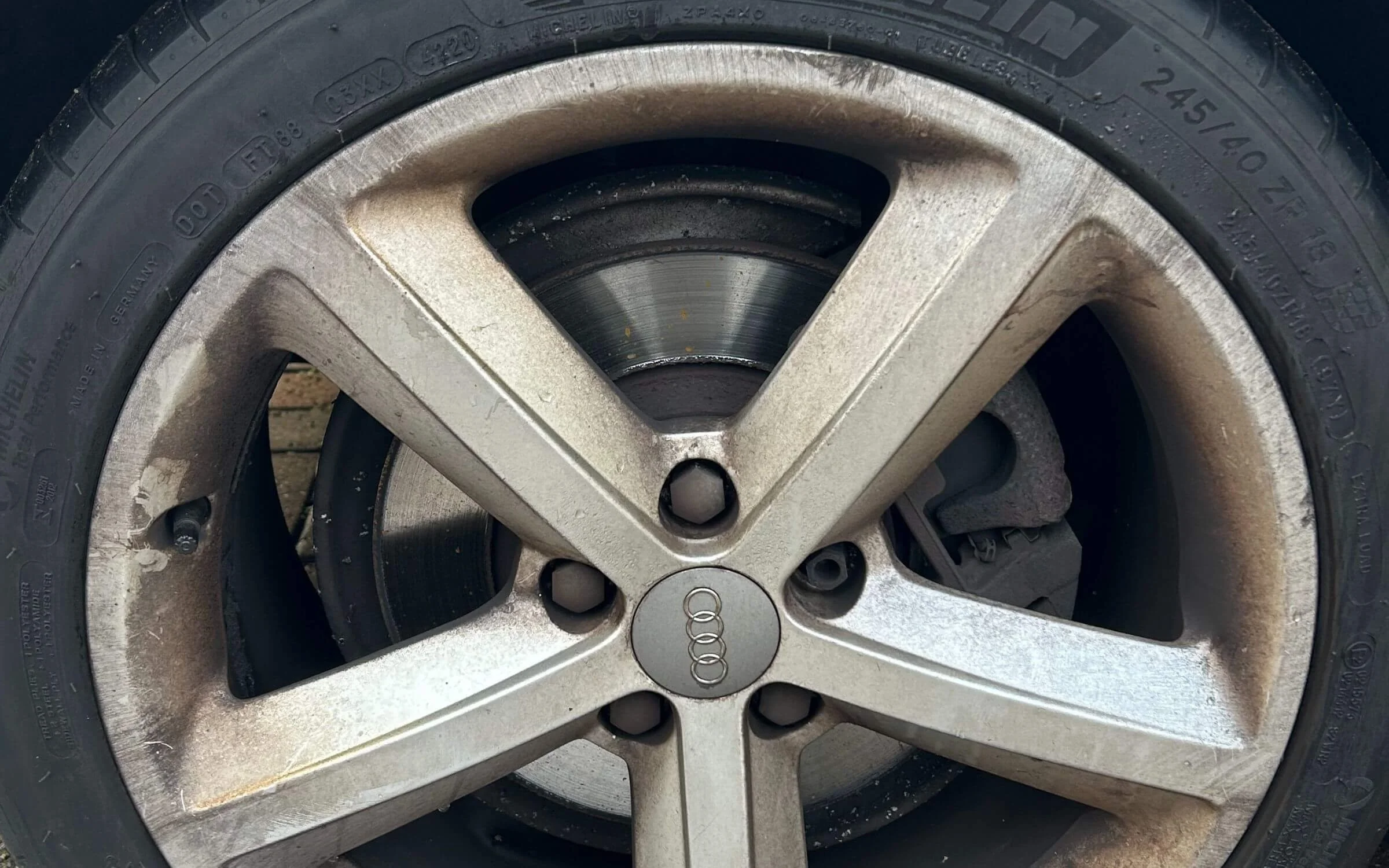 Before: wheel with embedded brake dust