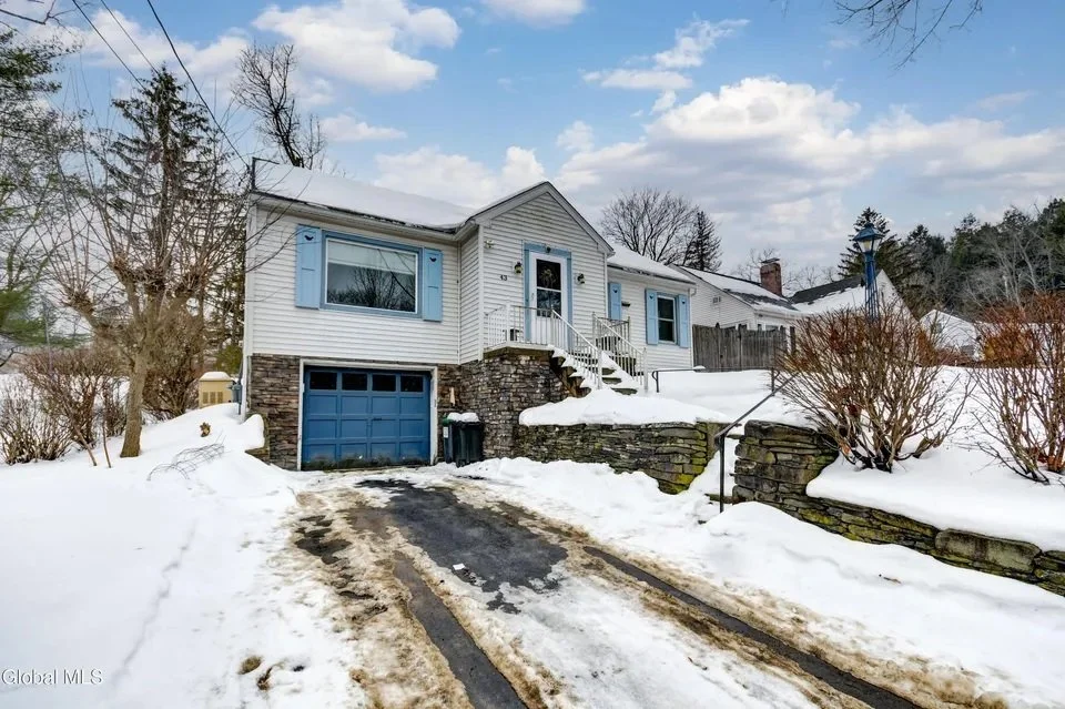 Exterior and garage of the sold home at 43 Ridge Road in Canajoharie, New York