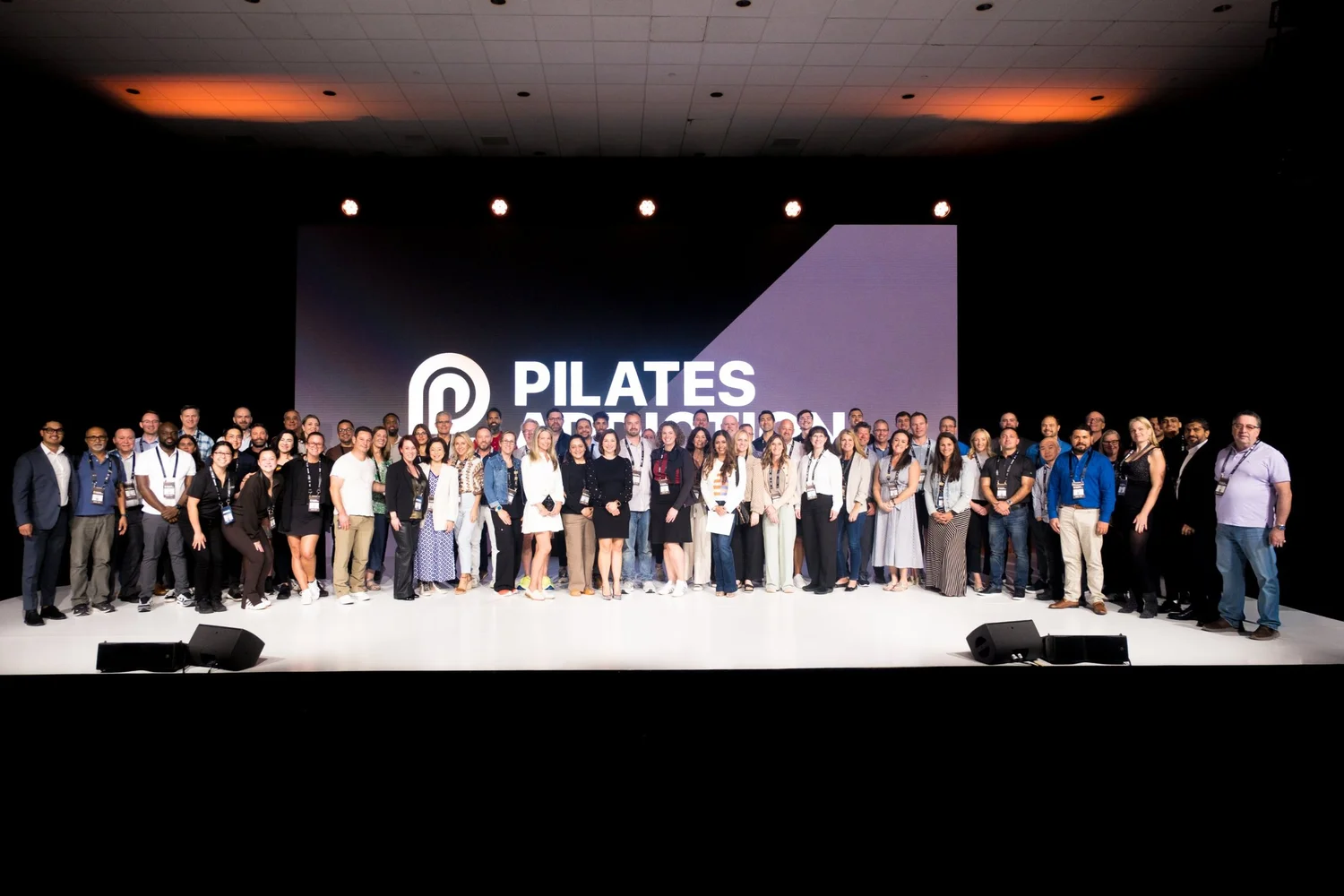 Pilates Addiction owners together on stage in Miami