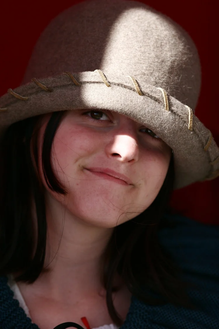 Girl in a felt hat