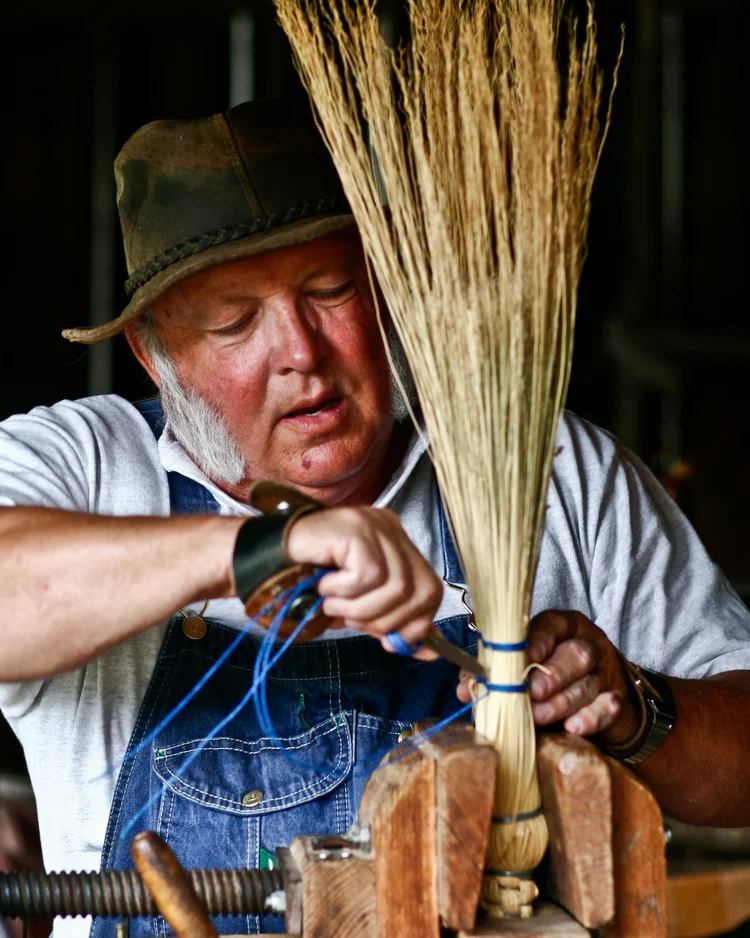 Broom maker at work