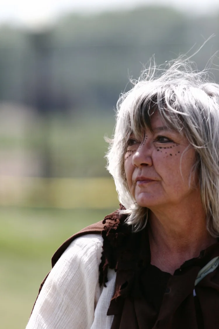 Woman with silver hair outdoors