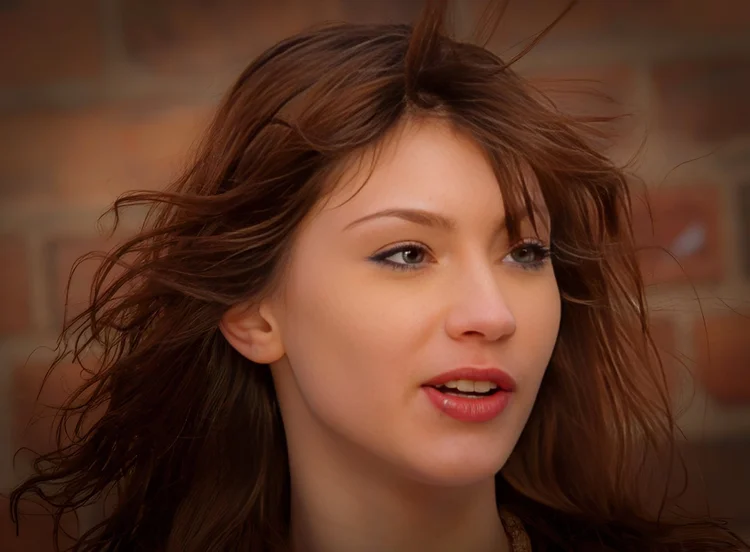 Young woman, wind in her hair