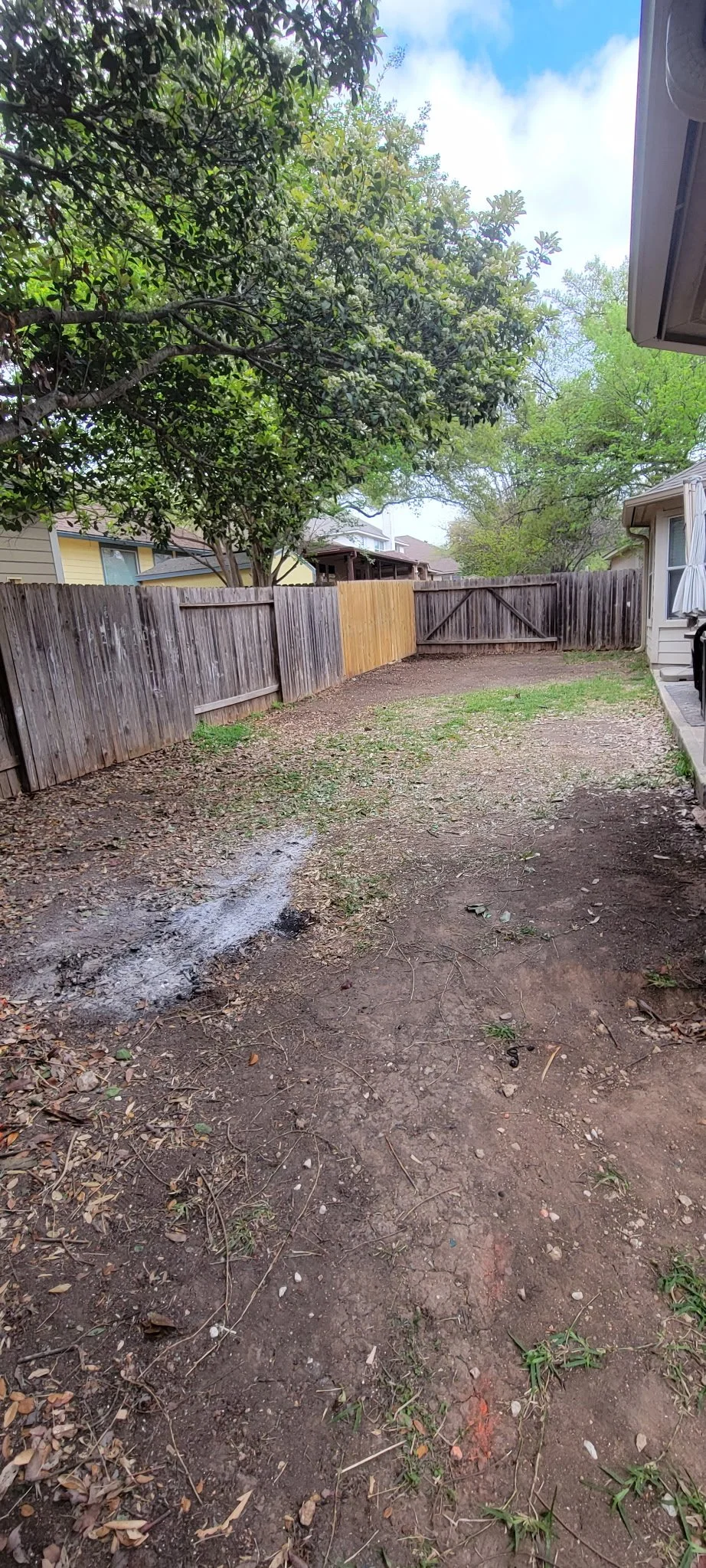 Stone Oak backyard before artificial turf installation