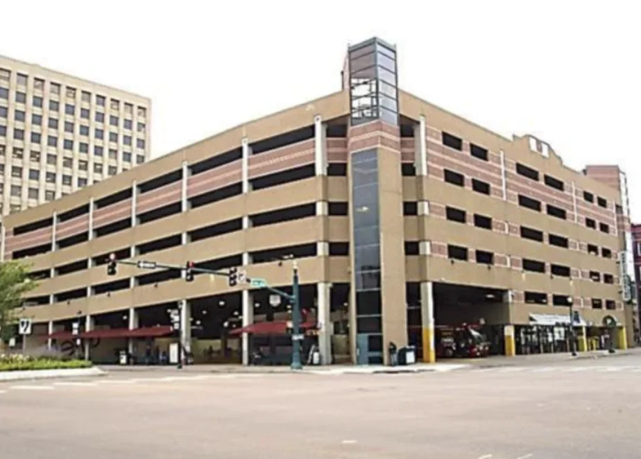 Multi-story parking structure in Colorado Springs with a tan facade
