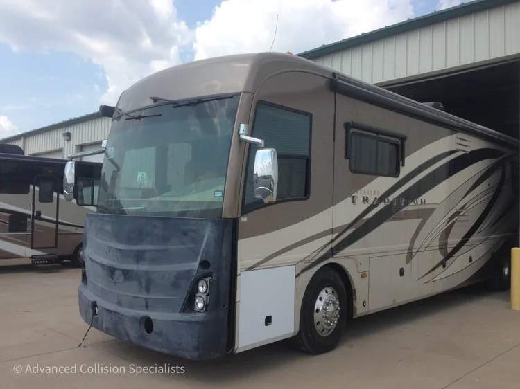 Class A motorhome with rebuilt fiberglass front cap in primer – Advanced Collision Specialists, Burleson TX