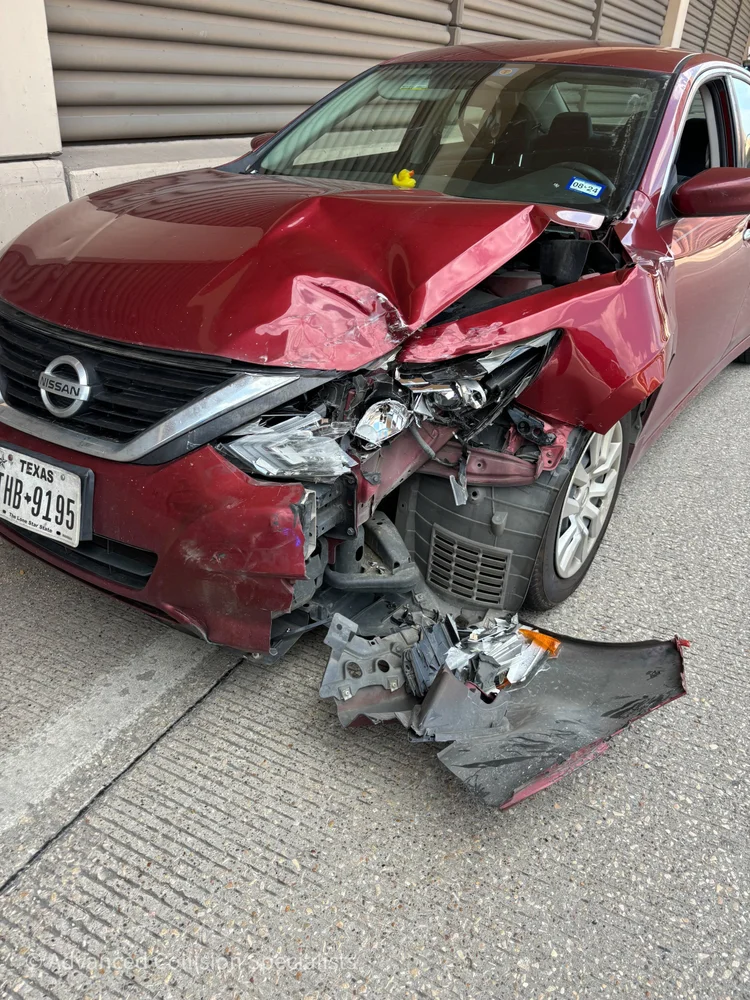 Red Nissan Altima with front-end collision damage – Advanced Collision Specialists, Burleson TX