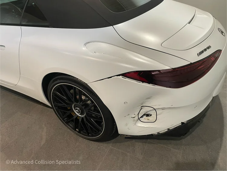 White Mercedes-Benz with rear corner scrape and dent – Advanced Collision Specialists, Burleson TX