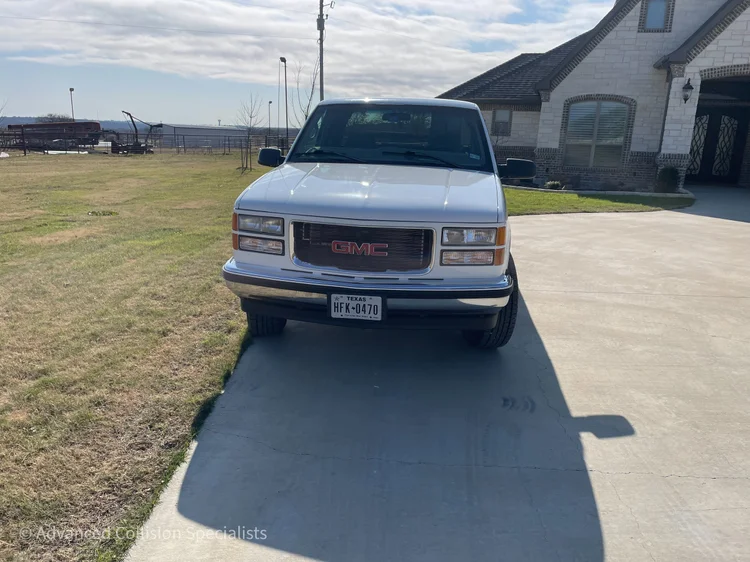 White GMC pickup after front-end rebuild – Advanced Collision Specialists, Burleson TX