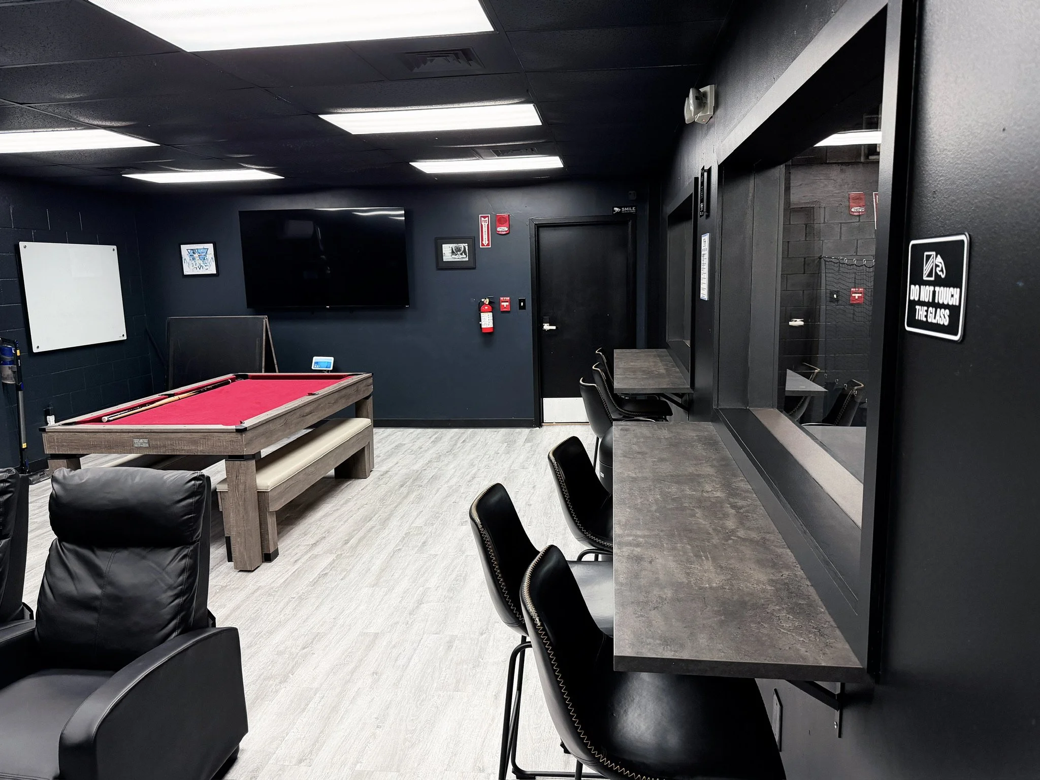 TPSI media lounge pool table and theater seating Tampa