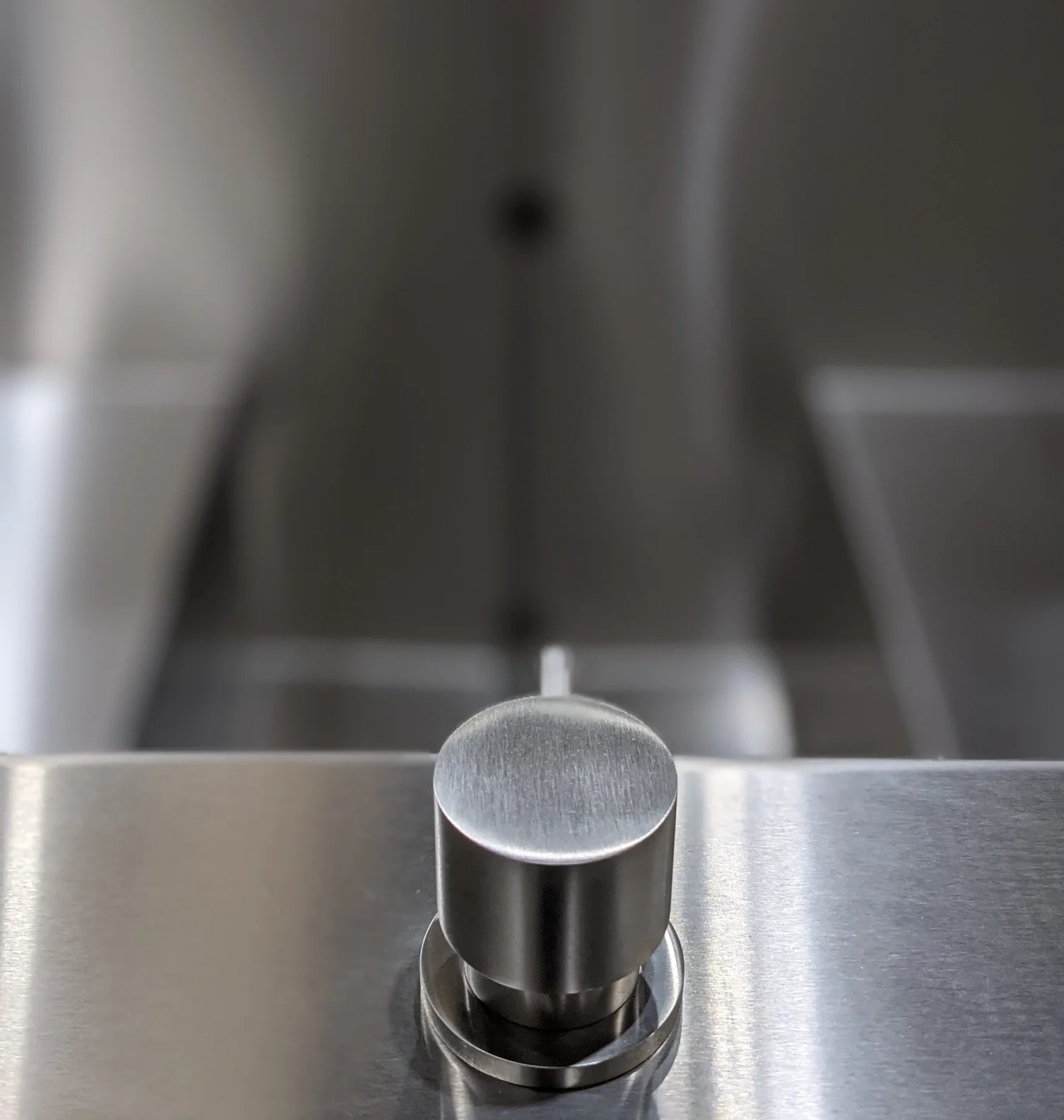 The stainless steel tap on the tub