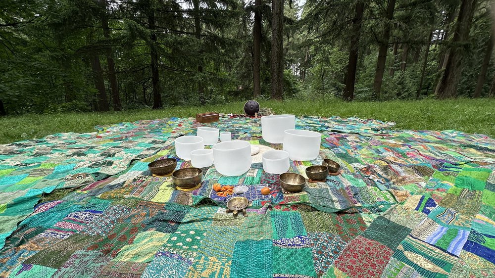 Park Lab on Mt. Tabor: crystal and Tibetan bowls on patchwork quilts in a clearing ringed by fir trees