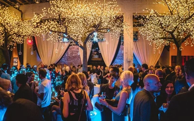 Special event guests under warm lights
