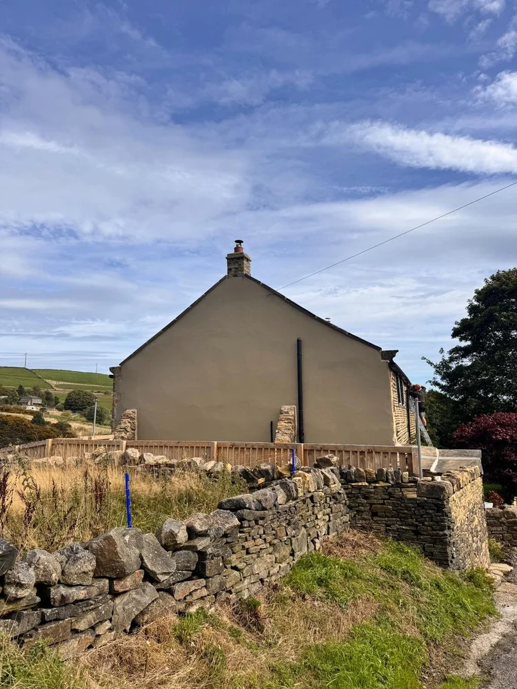 Bolstermoor house gable end after maintenance and repainting with breathable paint
