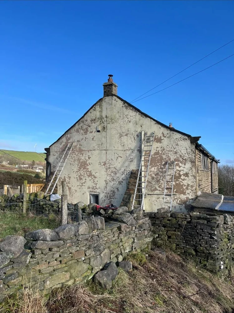 Weathered paint on the gable end of the Bolstermoor house before maintenance