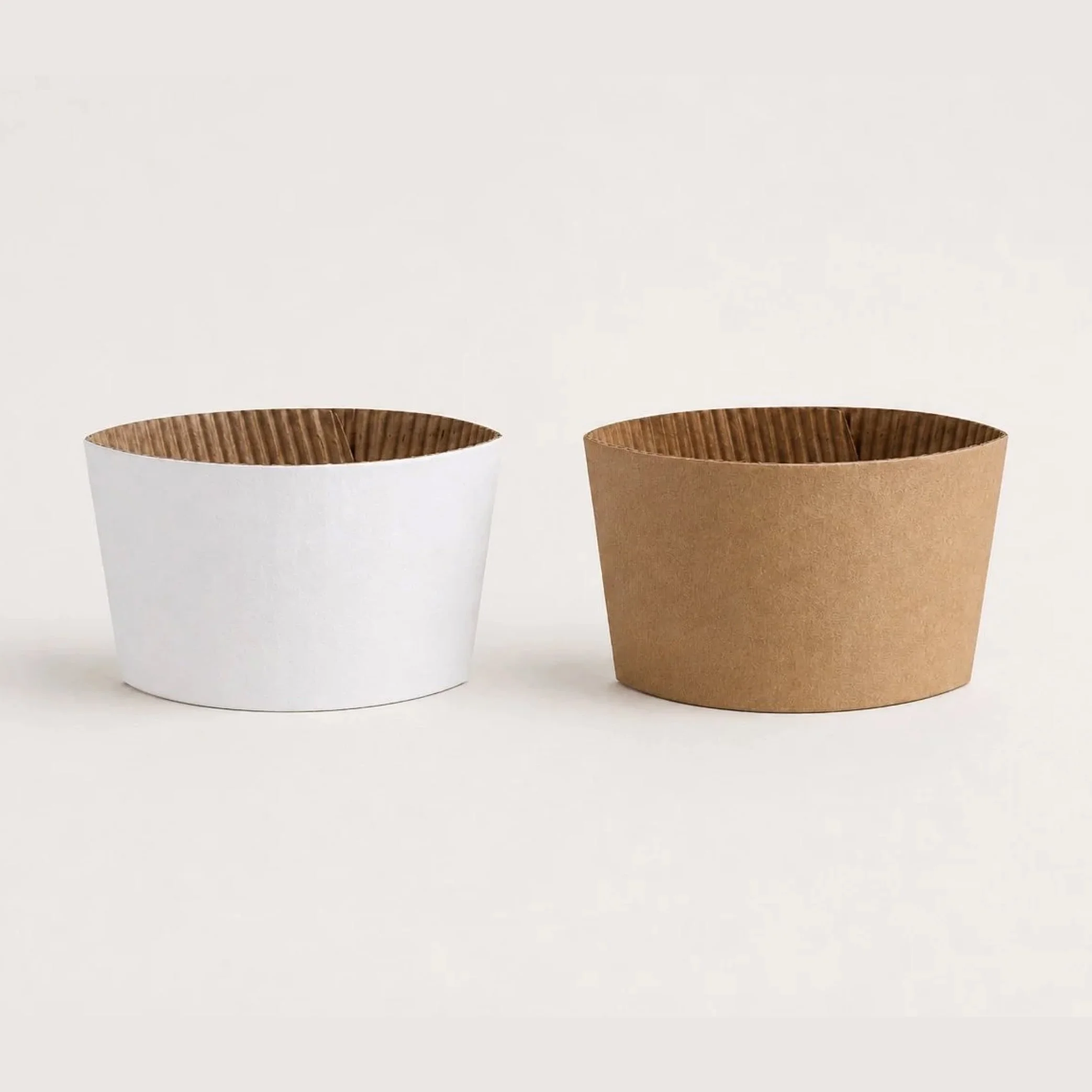 White and kraft paper cup sleeves
