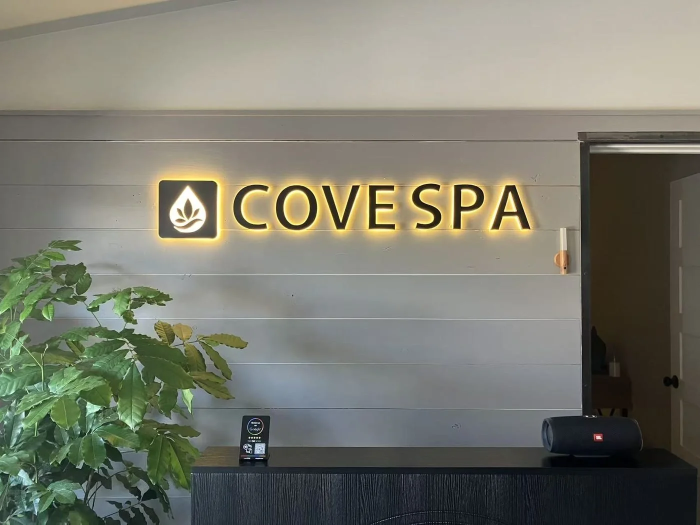 Cove Spa reception sign in Westlake Austin