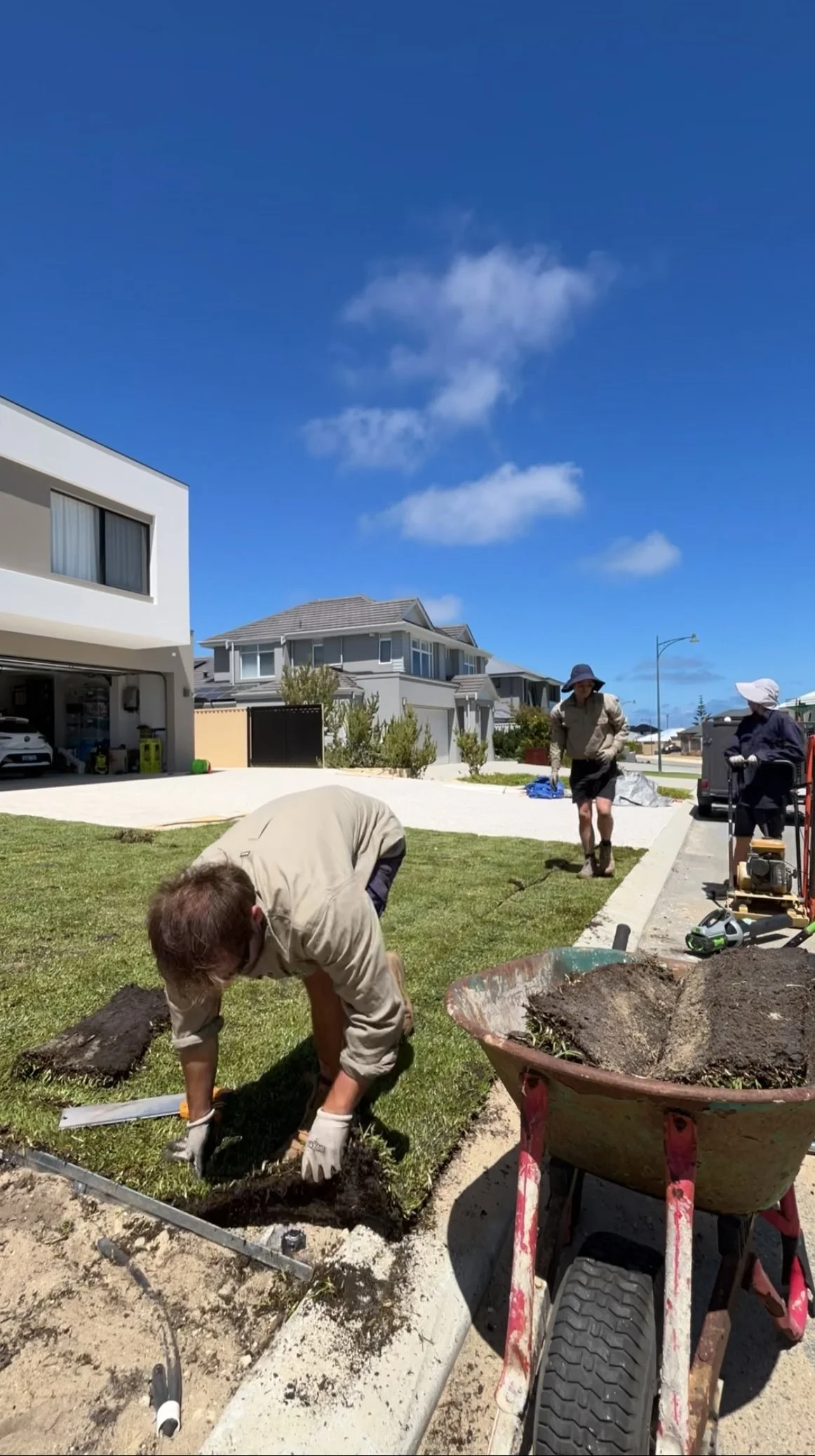 The Garden Collective team working on a Perth landscaping project