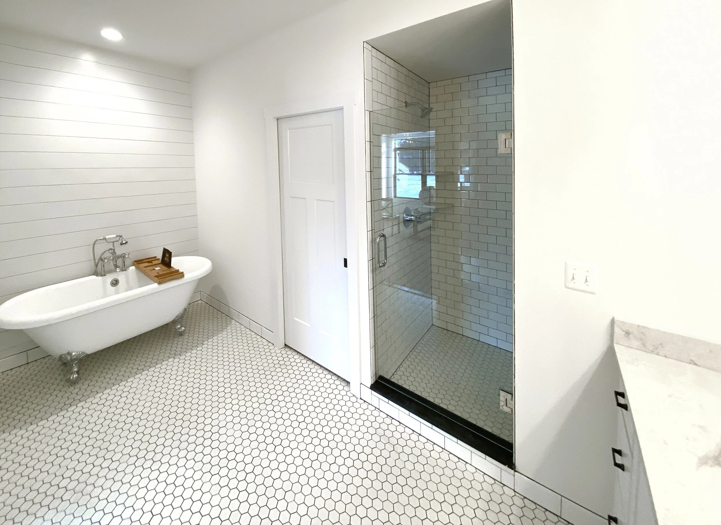 Modern cottage feel in this luxurious master bathroom