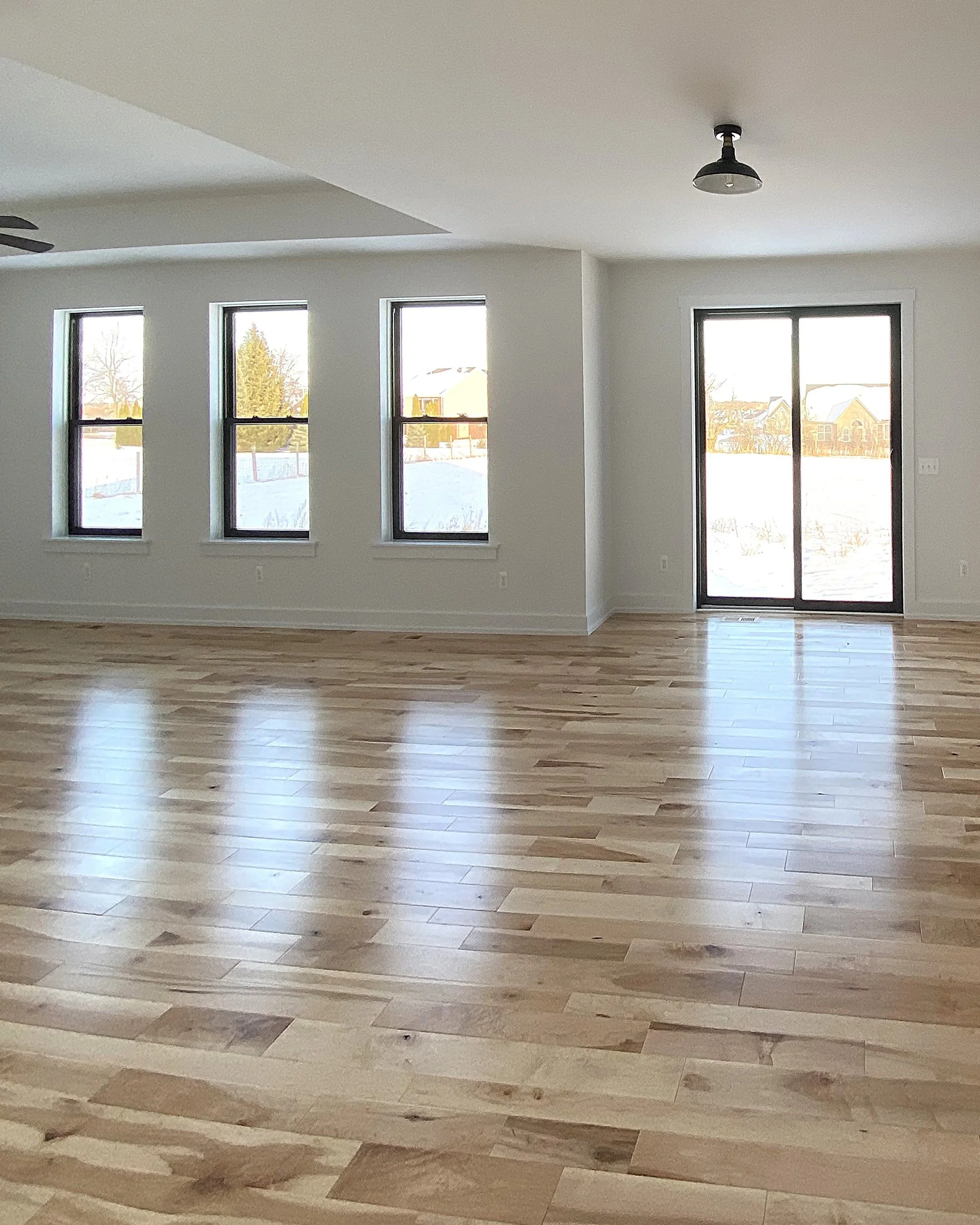 open concept family room with patio door access