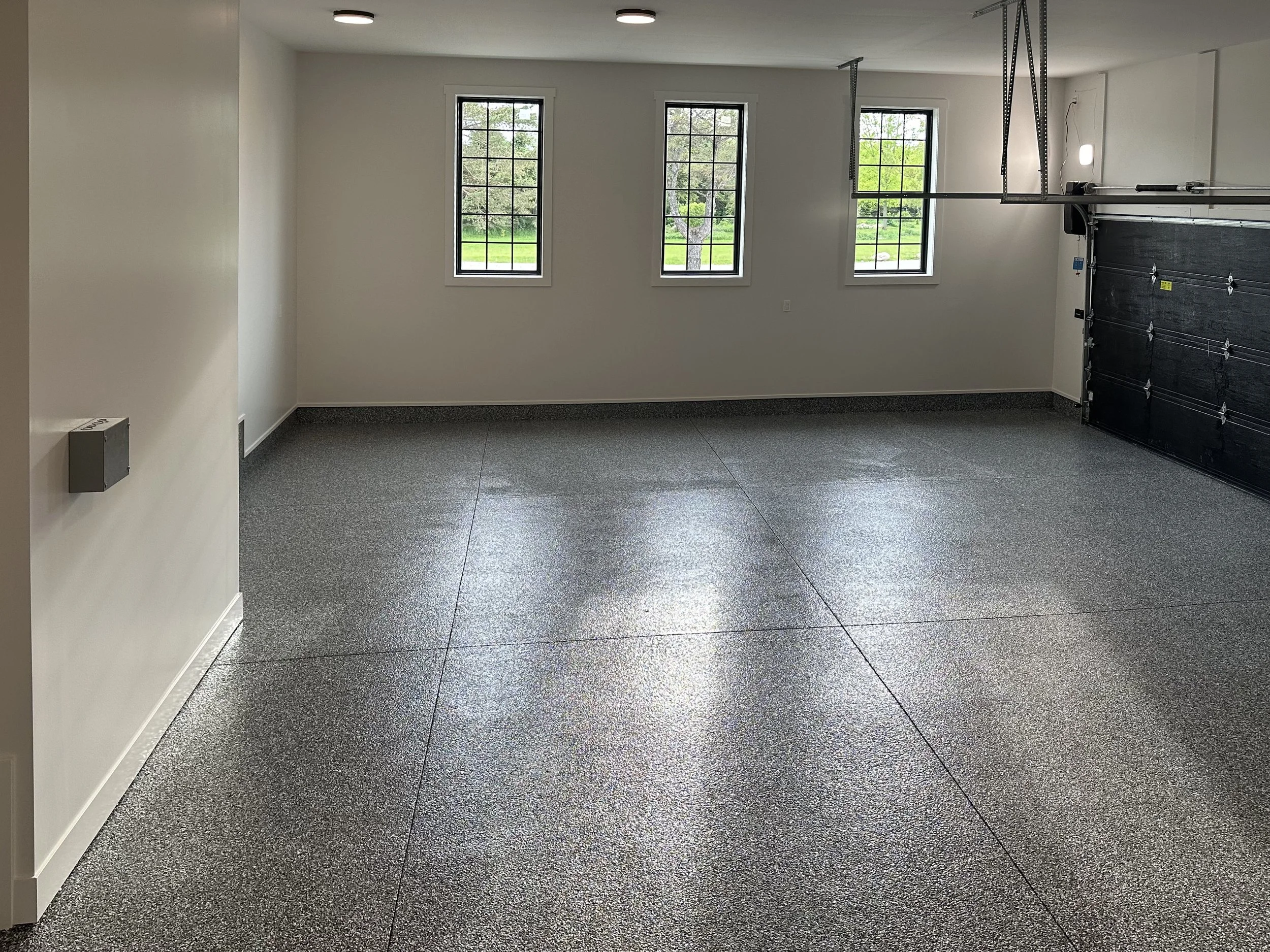 custom dream garage with epoxy floors