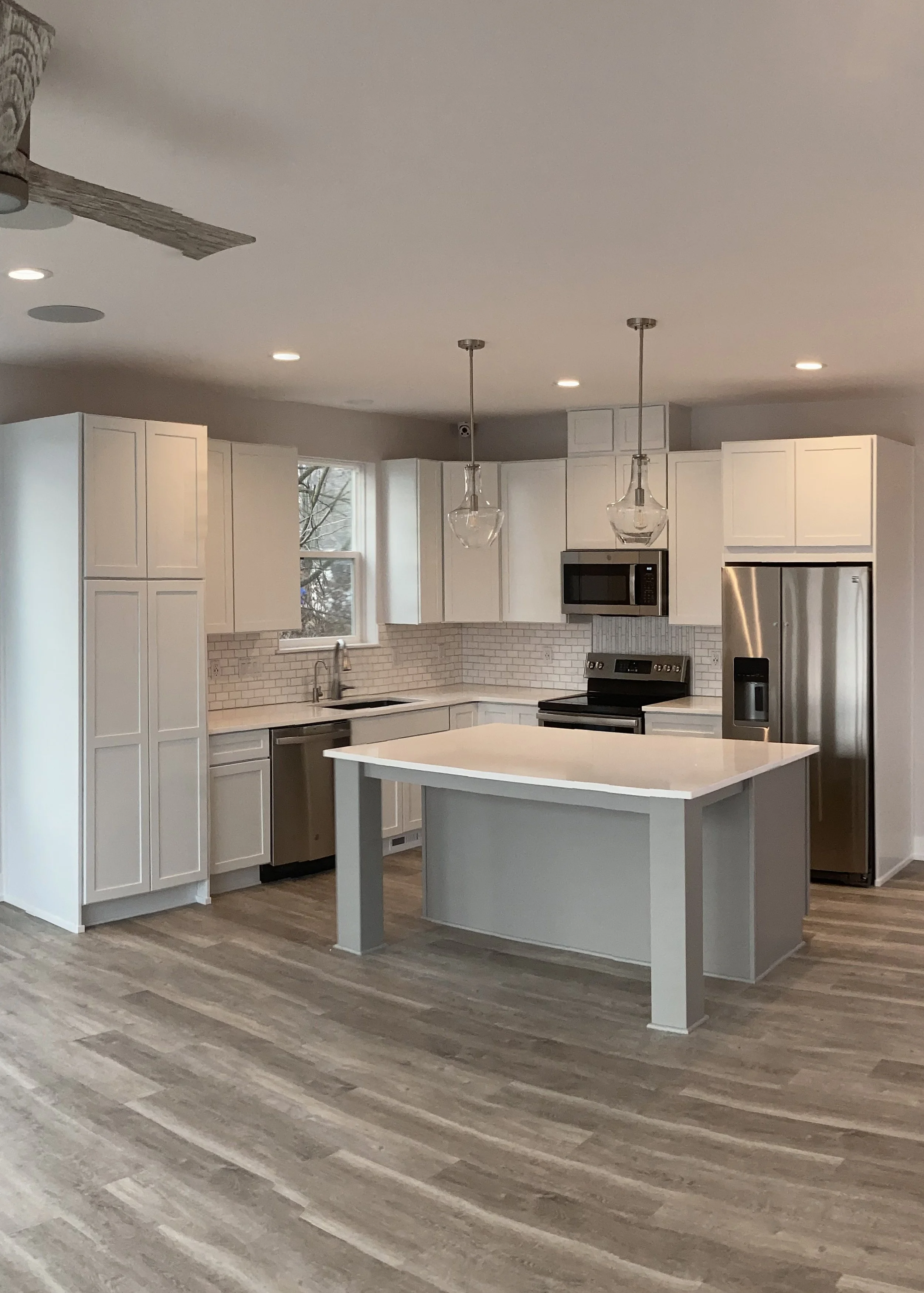 modern kitchen with plenty of surface area and seating space