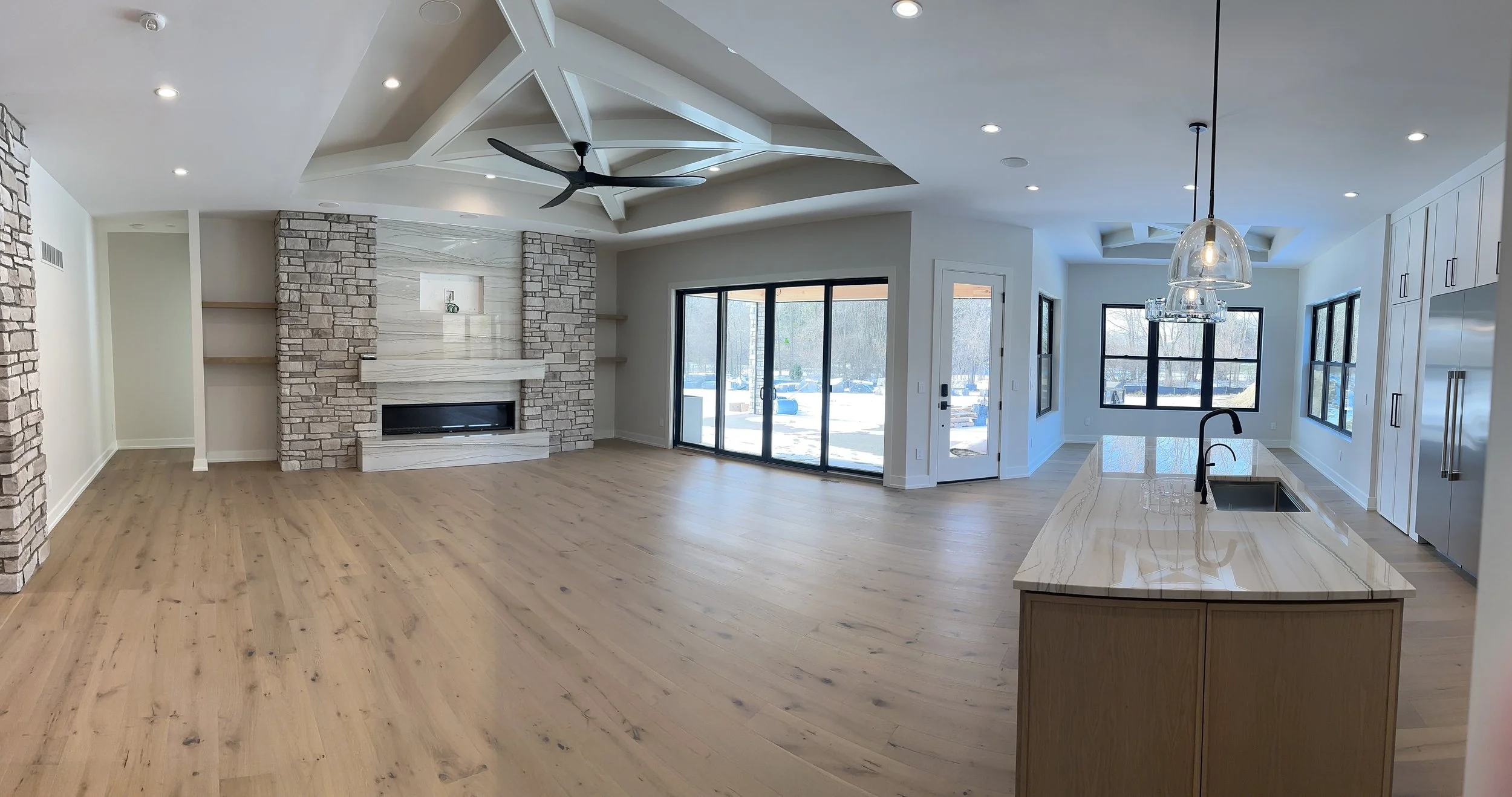 a wide angle shot provide perspective and showcases the home's open feel