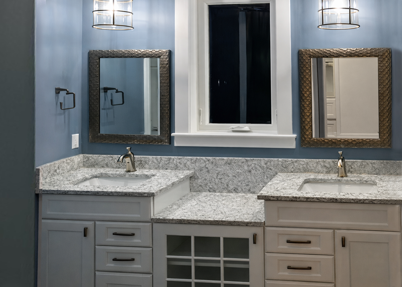 designerly master bathroom with centered window for natural light