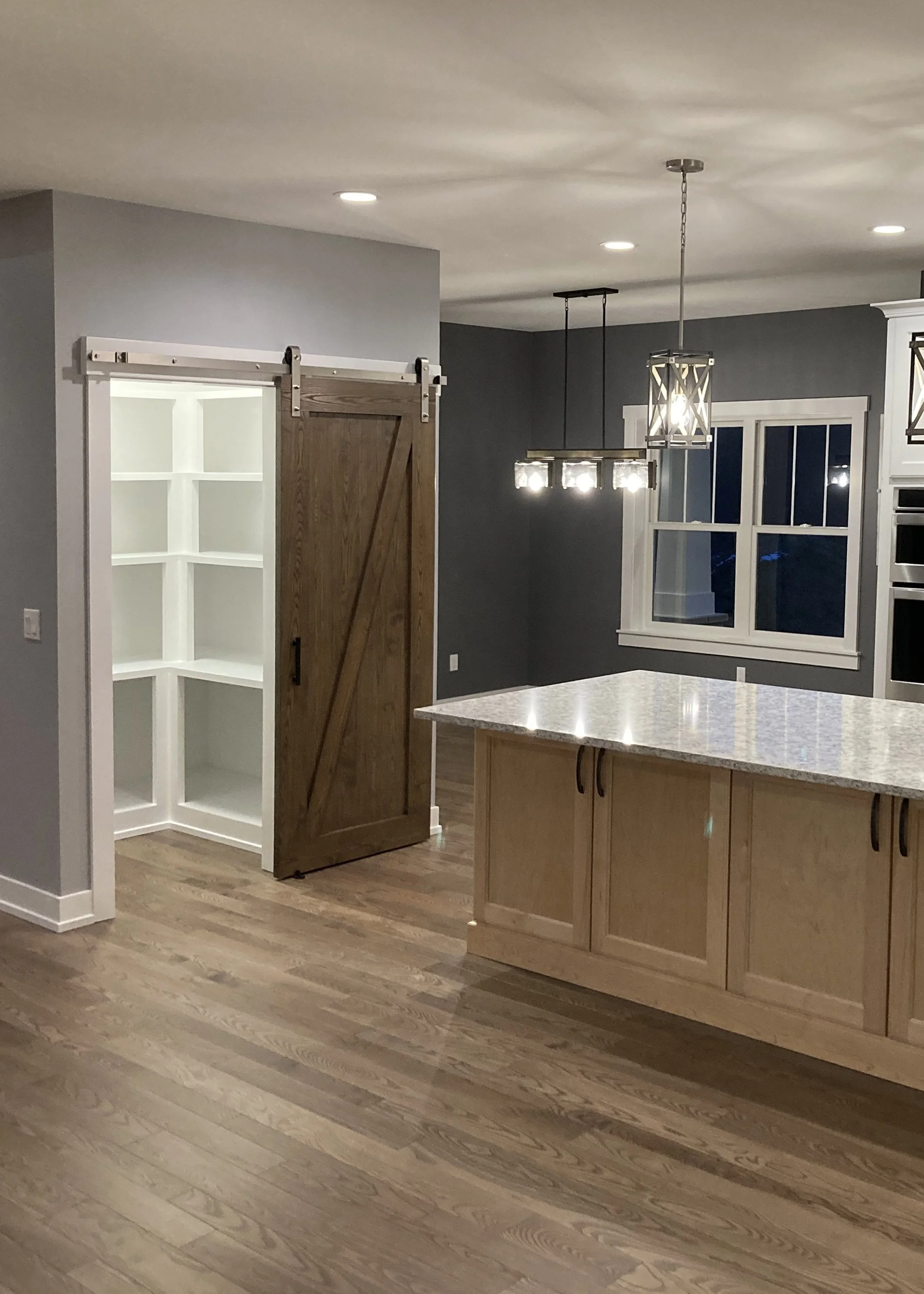 kitchen with seating nook and walk-in pantry