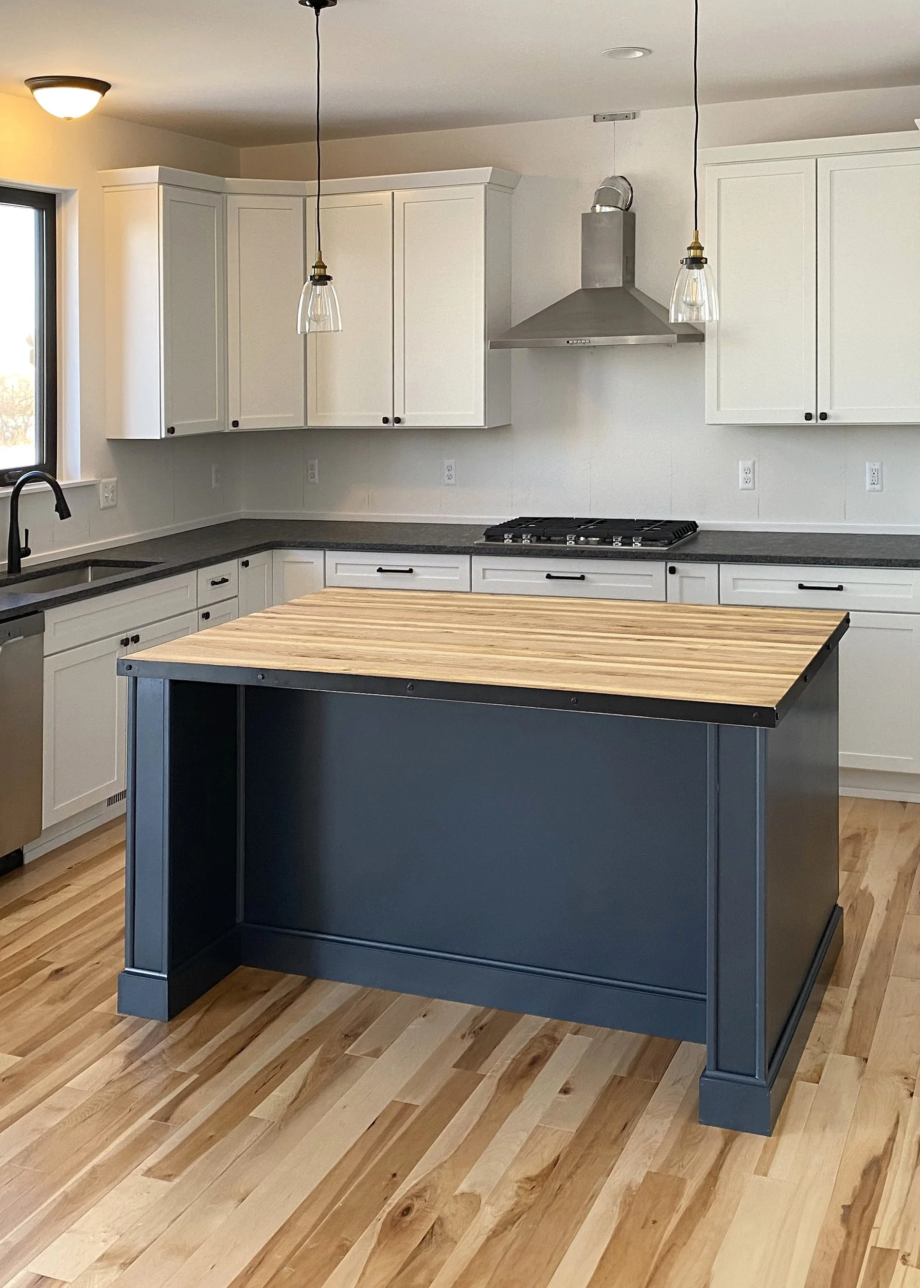 Custom kitchen with butcher block counter top island