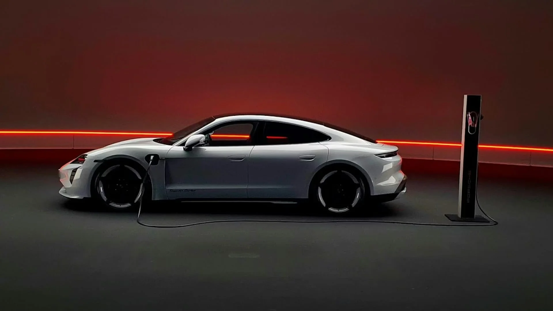 Porsche Taycan side profile at charging station