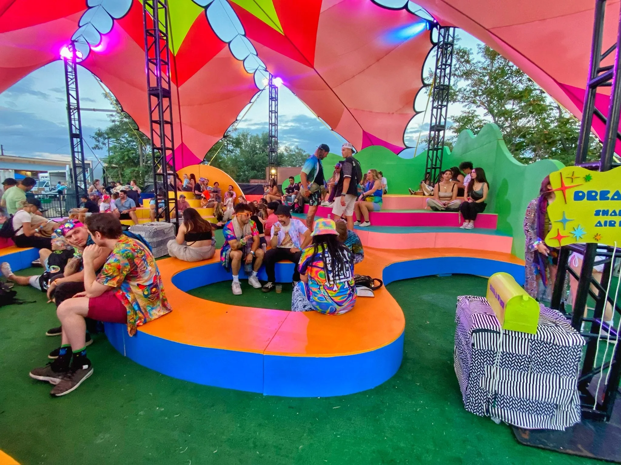 Festival-goers gathered on the curved seating structure