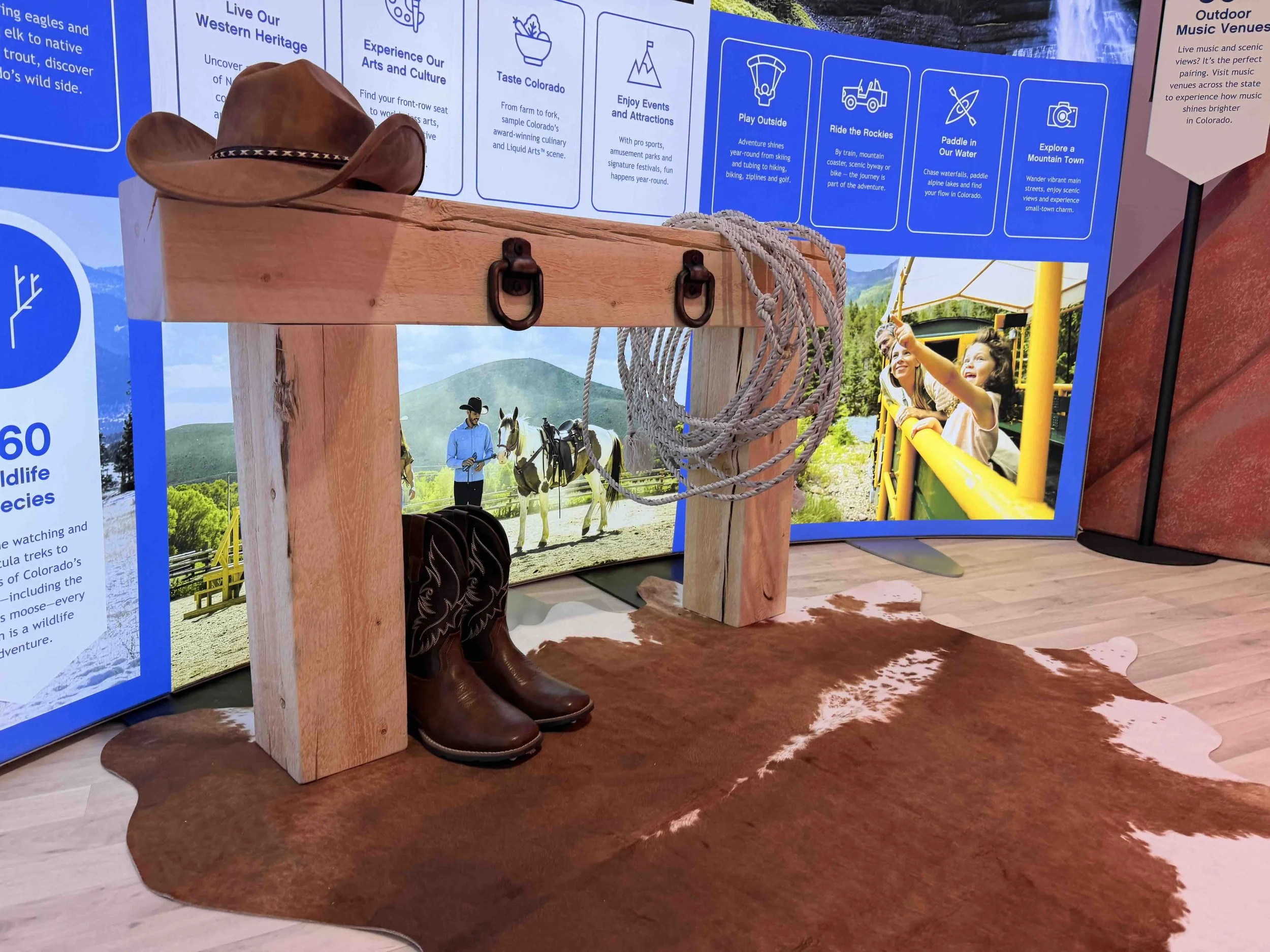 Western heritage display with cowboy hat and boots