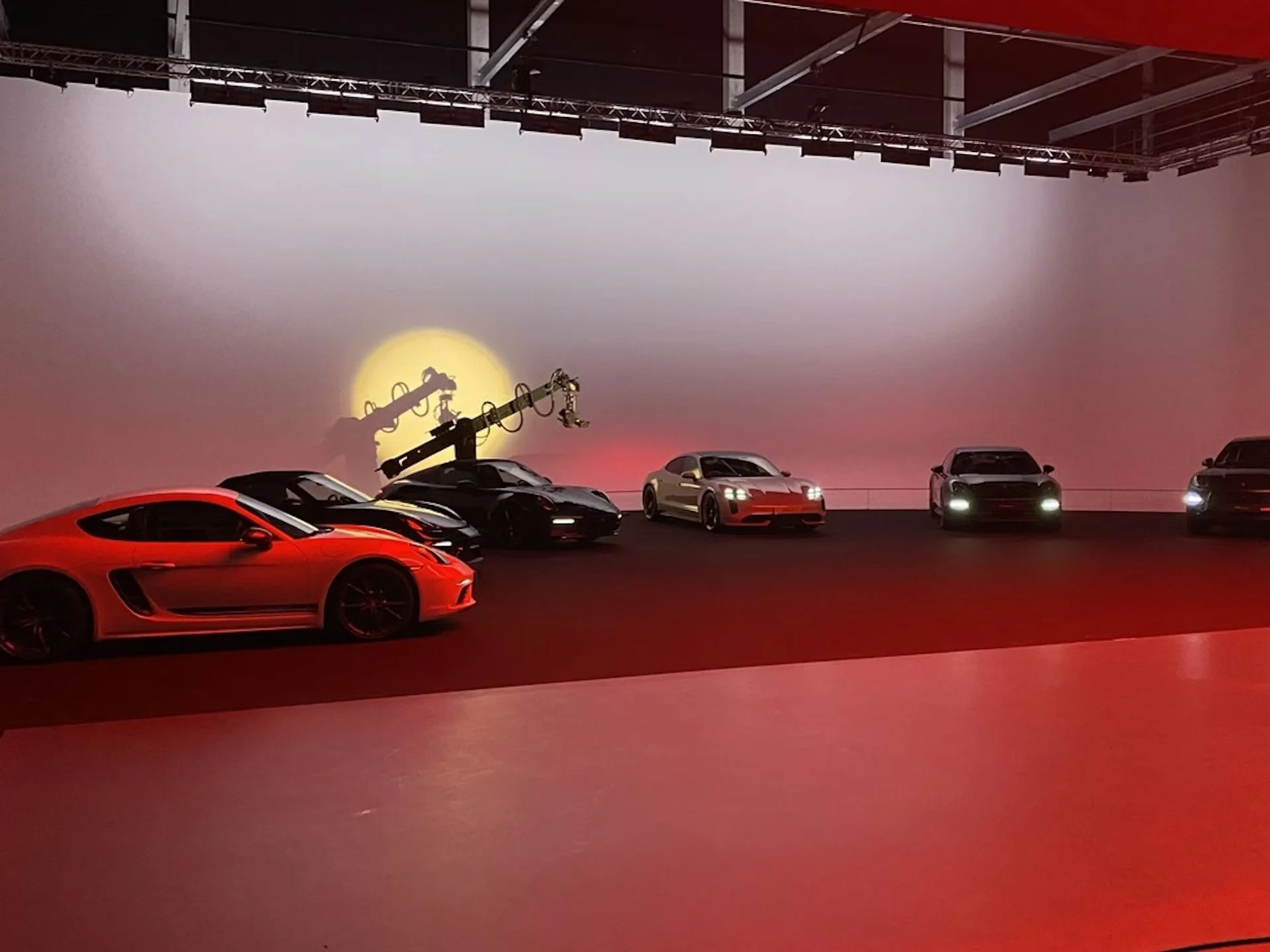 Porsche Next production studio with full lineup