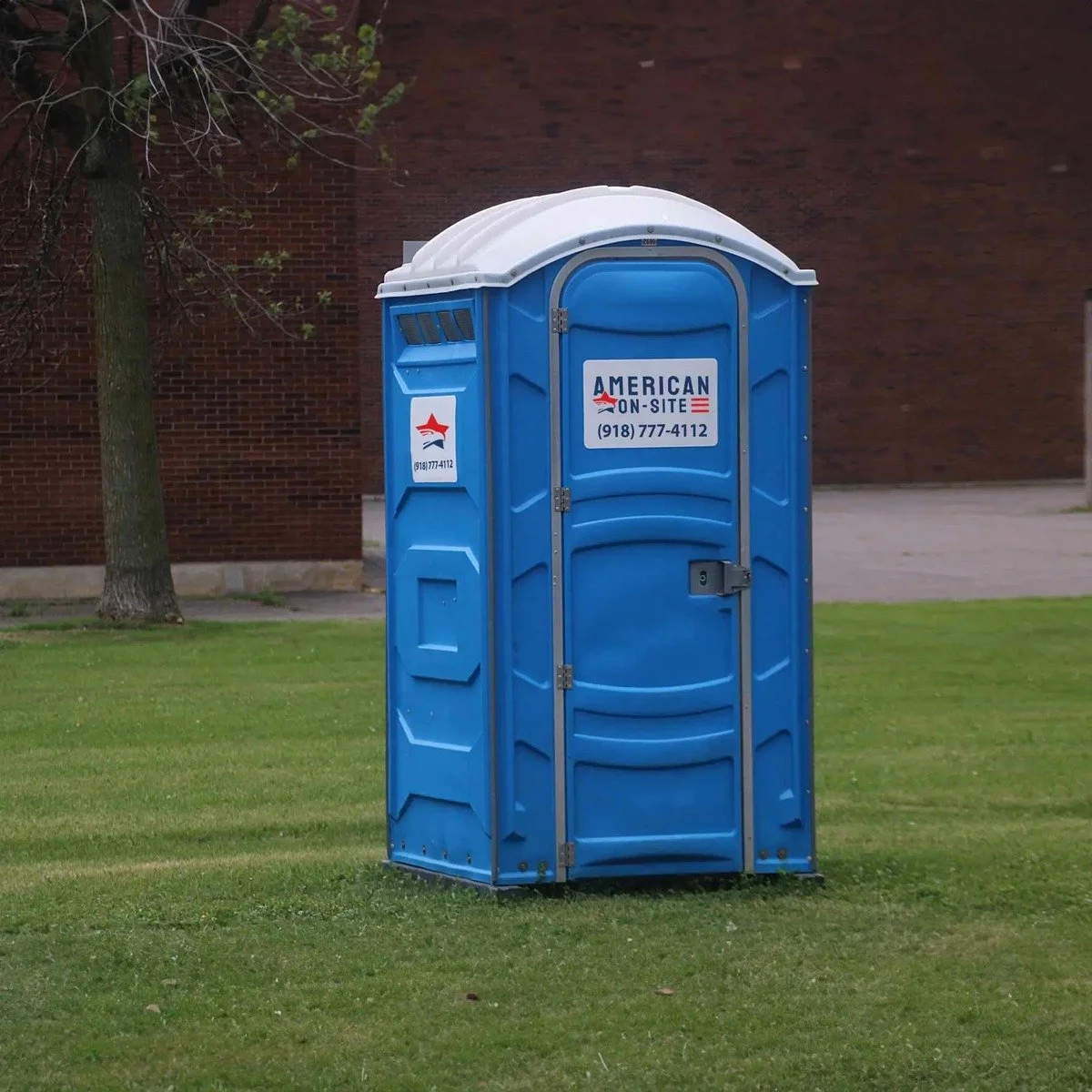Jobsite portable restrooms set where crews can reach them for construction toilets and fencing near me in Fort Lauderdale, FL.