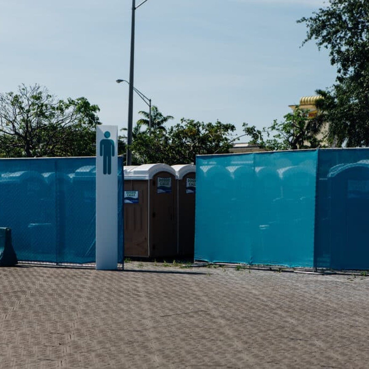 Temporary fencing prepared for a developing jobsite with construction toilets and fencing service in Pembroke Pines, FL.